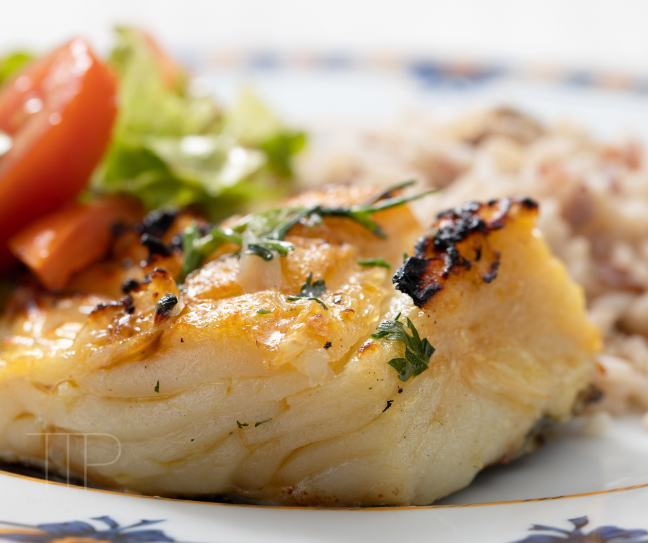 grilled cod fish slice with salad and rice