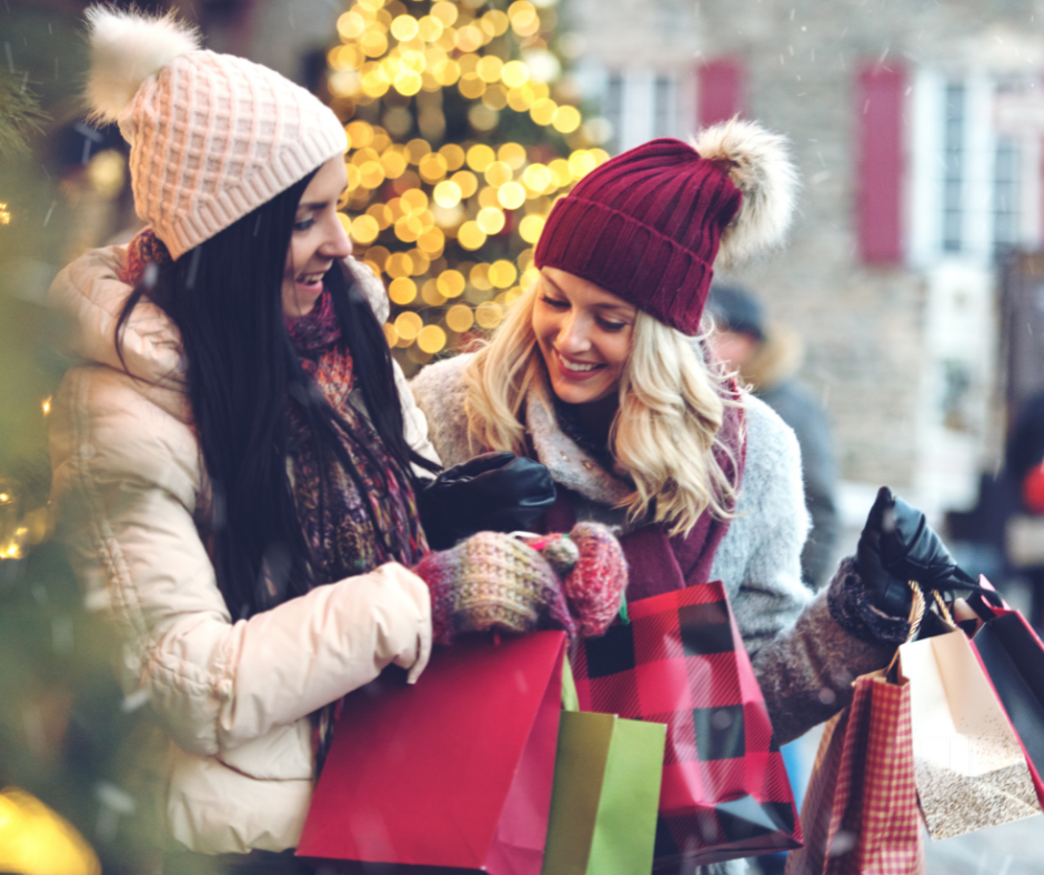 2 women during christmas shopping