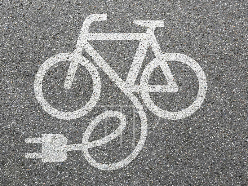 symbol of E Bike recharging on street