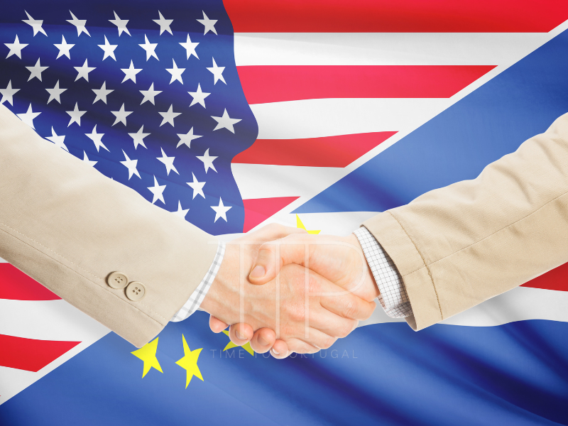 The flags of the United States and Cape Verde and a handshake
