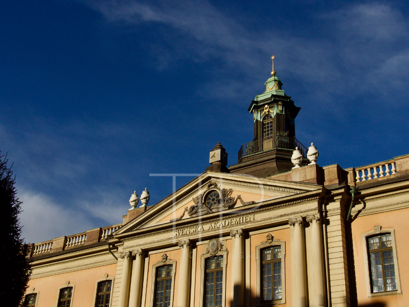 old museum building with blue sky in background